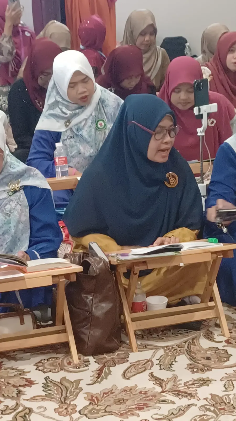 Invited guests reading Maulid at Raudhatul Jannah’s anniversary gathering