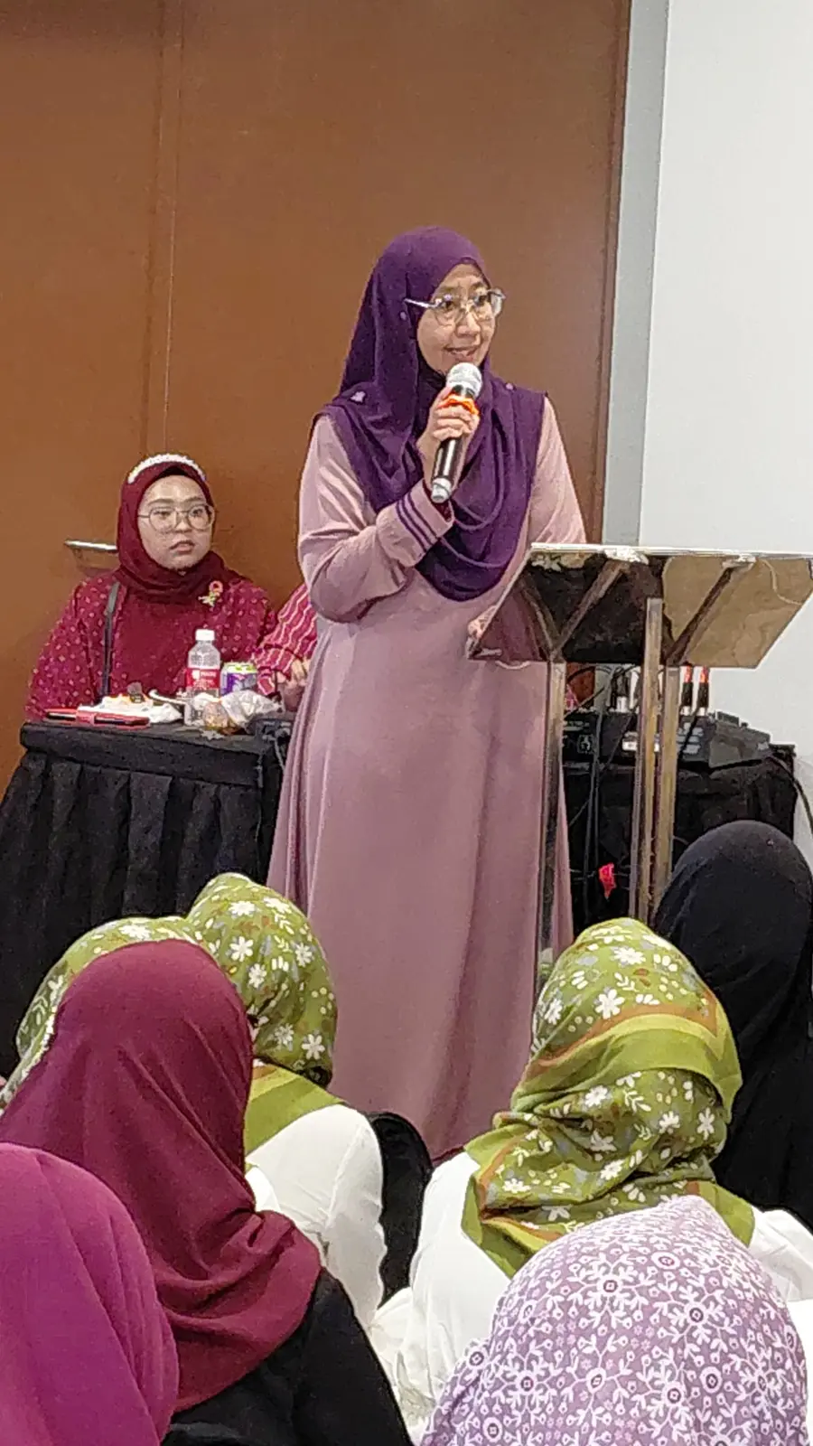 Ustazah Noridah Bashir addressing the tenth-anniversary gathering